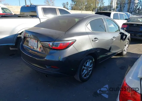 2017 Toyota Yaris Ia из США, поврежденный, VIN 3MYDLBYV6HY168376